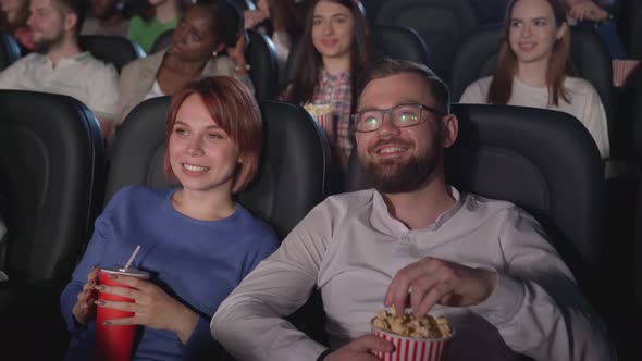 Red Headed Woman Enjoying Movie Cinema