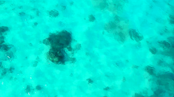 Sea Surface in a Turquoise Lagoon Top View