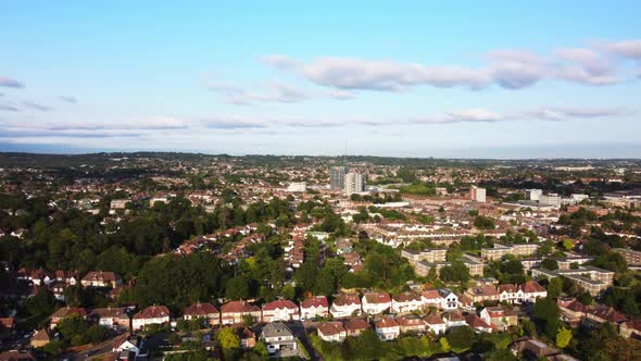 Aerial over Edgware town in North London. The camera pans right to left.