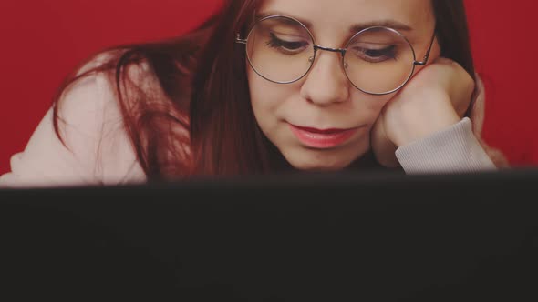 Young Woman Using Laptop in Studio