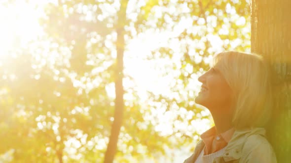 Happy woman in park