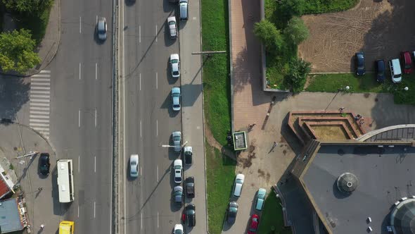 Two way lane commuter traffic next to a rooftop building at Kyiv Ukraine, top shot