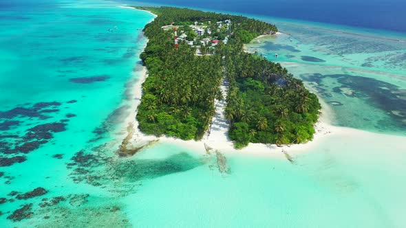 Wide angle aerial clean view of a paradise sunny white sand beach and turquoise sea background