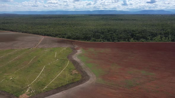 Amazon rainforest deforested to create farmland in Brazil - aerial view