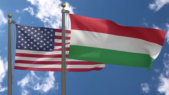 Usa Flag Vs Hungary Flag On Flagpole