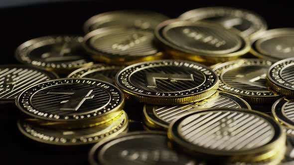 Rotating shot of Bitcoins (digital cryptocurrency) - BITCOIN LITECOIN 