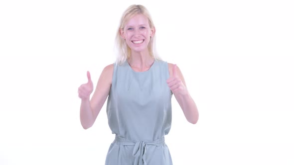 Happy Young Beautiful Blonde Woman Giving Thumbs Up and Looking Excited