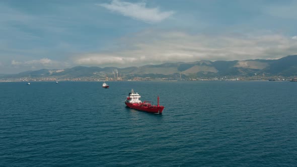 Copter View of Anchored Cargo Container Ship in Coastal Waters