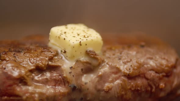 Delicious Appetizing Grilled Beef Fillet Sprinkled with Spices Under Melting and Dripping Butter