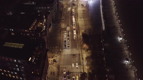 Aerial view of vehicles driving a busy road at night in Shanghai, China.