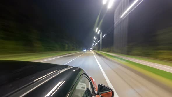 Drivelapse From Top Side of Car Moving on a Night Highway Timelapse Hyperlapse