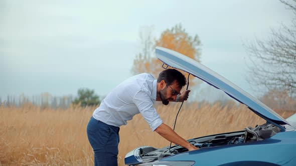 Man On Broken Car Accident. Vehicle Check Engine Oil Level. Car Engine Overheating. Open Hood Motor.