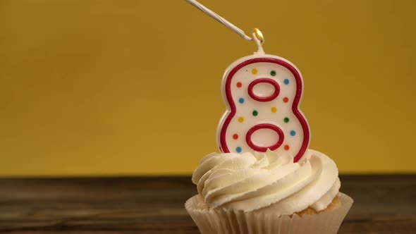 Cupcake With Number 8 Candle