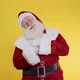 Santa Claus infarcting on yellow background. Santa having a sudden heart attack and feeling bad - VideoHive Item for Sale