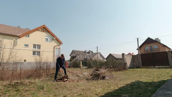 Man Fixing An Ax