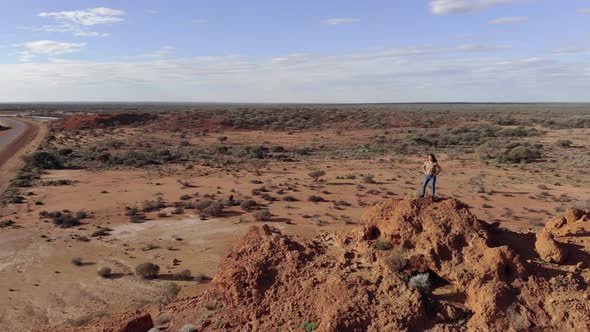 Aerial Shot of Young Woman Traveler Exploring Australian Remote Desert