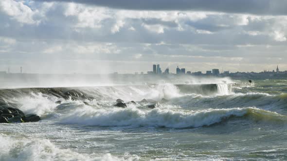 Water Cascade from Waves Crashing to the Pier