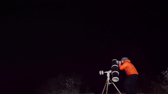 Experienced Amateur Astronomer Adjusts His Professional Large Newtonian Reflecting Telescope