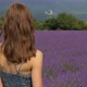 Portrait of young woman standing in lavender field in southern France - VideoHive Item for Sale