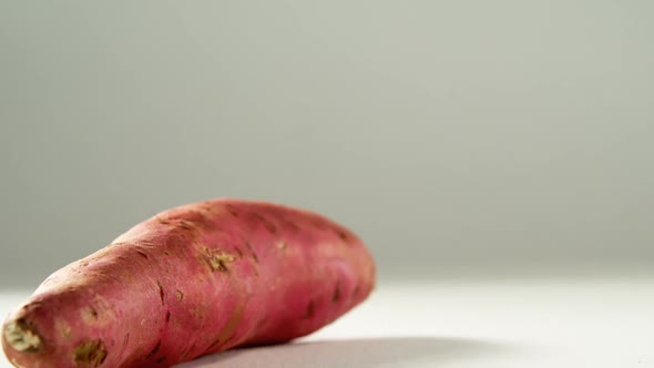 Sweet potato placed on white background