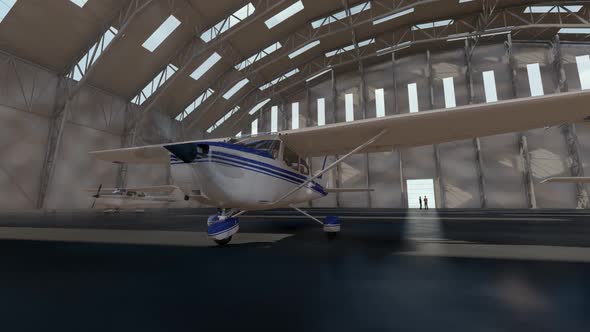 Airplane Standing in Hangar
