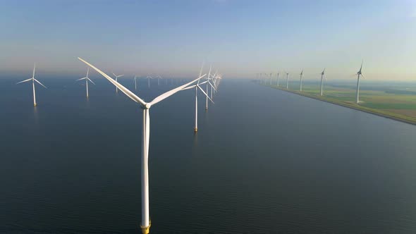 Wind Turbines in the Early Morning Wind Mill Park in the Netherlands