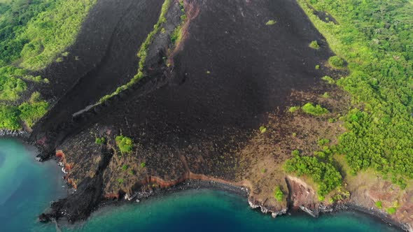 Aerial: flying over active volcano lava flows Gunung Api, Banda Islands, Maluku, Indonesia