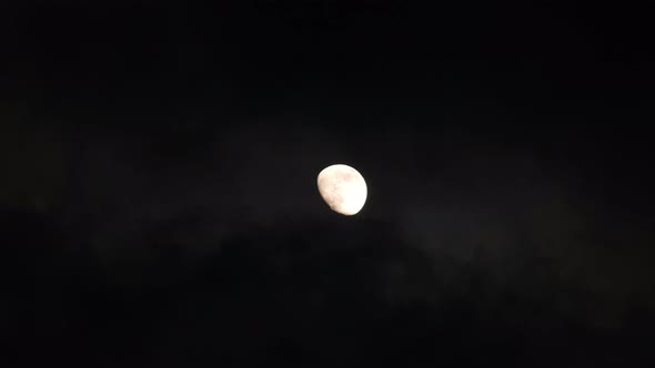 Astronomy Concept Beautiful Full Moon in Black Clouds