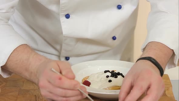 Serving Biscuit Dessert with Berries