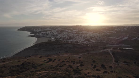 Evening in Praia da Luz Townscape from Rocha Negra viewpoint - Aerial