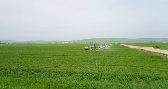 Aerial View of sprinkler at work among the cultivated fields, Beit Alfa.