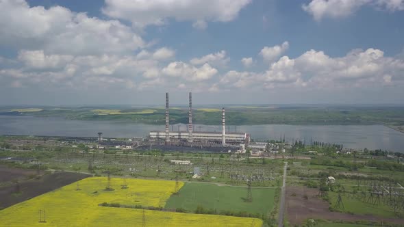 Thermal Power Plant on the Background of an Artificial Reservoir. Video From the Drone. Electricity