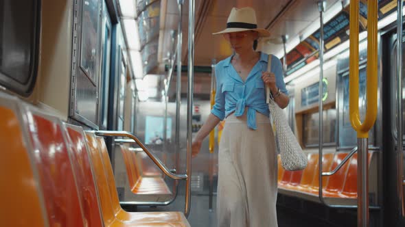 Young passenger in train, NYC