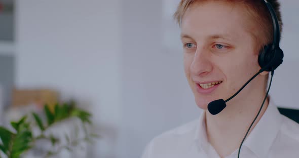 Helpdesk Support Man Talking on Headset Video Conference