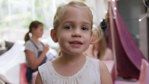 Portrait girl looking at the camera