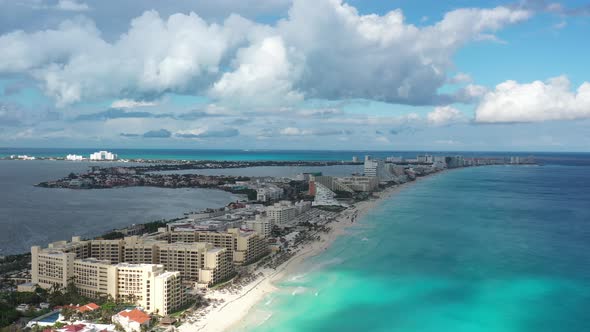 Aerial Panoramic View of the Skyline in Cancun, Mexico With a Cloudy Sky as Background