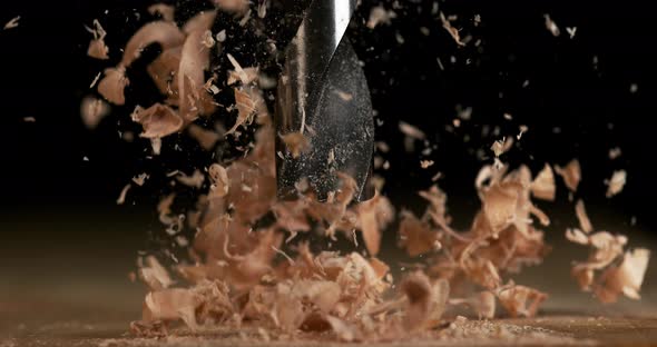 Wood Chip Turning on a Wood Board, Making Chips, Slow Motion 4K