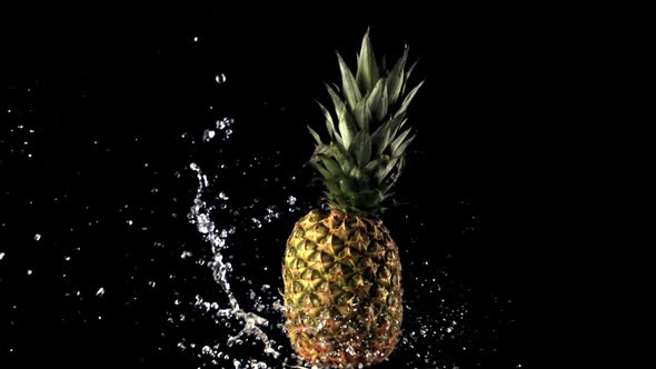 Super Slow Motion From the Rotating Pineapple Fly Drops of Water