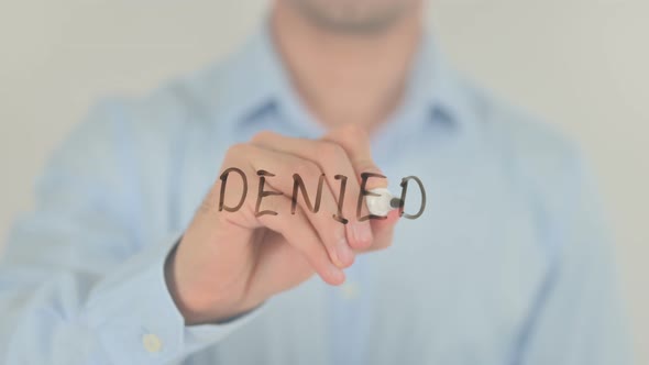 Denied, Man Writing on Transparent Screen