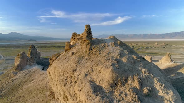 The Collection of Massive Stone Spires in the Middle of the Flat, Dusty, Hot Desert