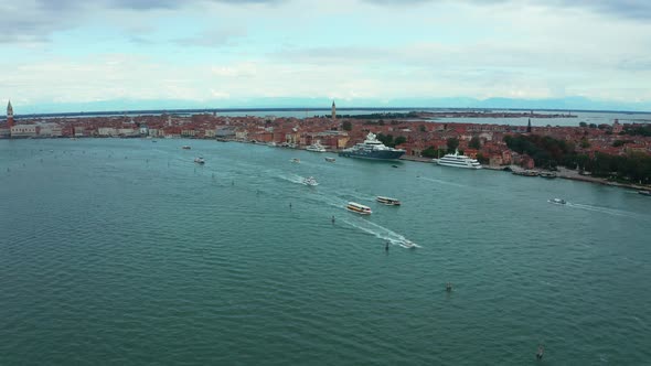 Venice Lagoon Aerial View with Luxury Yachts Docked Near Venice Center