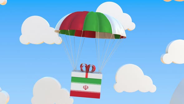 Carton with Flag of Iran Falls with a Parachute