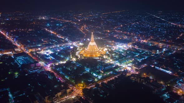 Hyper lapse of aerial top view of Phra Pathommachedi temple at night. Nakorn Pathom,Thailand