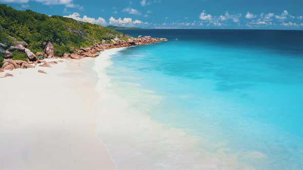 Drone Forward Flight Over Turquoise Crystal Clear Ocean Water Near to Tropical Paradise Beach with