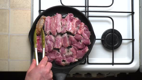 Real Home Cooking on a Frying Pan on a Regular Stove on the Kitchen