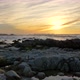 Slow Motion Pacific Ocean Waves Rolling in and Break on a Rocky Coast Under a Sunset Sky at Pacific - VideoHive Item for Sale
