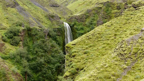 Close up aerial view of Nauthusagil Waterfall on the south coast of Iceland