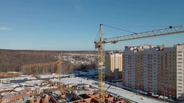 The Quadcopter Descends Parallel to the Construction Crane