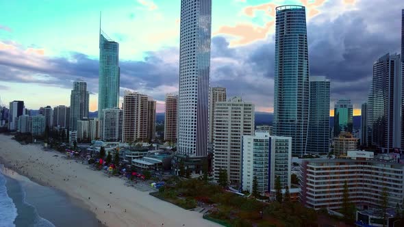 Aerial View Of Tourists On The Sandy Shore Of Gold Coast City In Queensland, Australia.