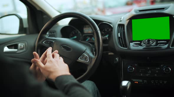 Man Driving in Innovative Automated Car Using Selfparking Autopilot for Parking on Parking Lot